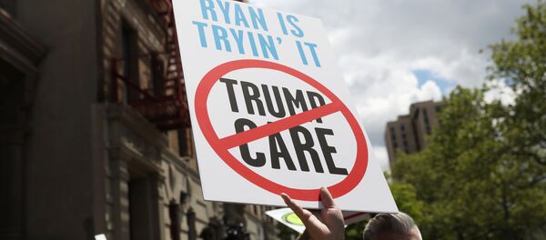 Demonstrators and healthcare activists rally before the visit of Speaker of the U.S. House of Representatives Paul Ryan at the Success Academy 1 charter school in Harlem, New York, U.S., May 9, 2017 Demonstrators and healthcare activists rally before the visit of Speaker of the U.S. House of Representatives Paul Ryan at the Success Academy 1 charter school in Harlem, New York, U.S., May 9, 2017 - Sputnik International