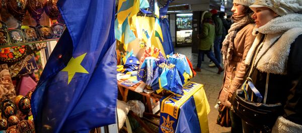 Girls look on at souvenirs in the underpass on Independence Square, Kiev. File photo Girls look on at souvenirs in the underpass on Independence Square, Kiev. File photo - Sputnik International