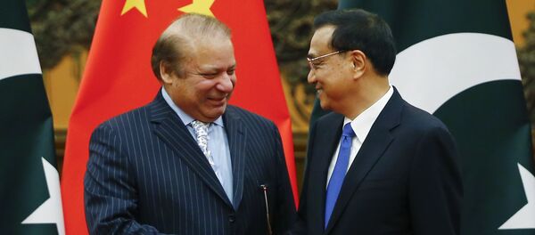 Chinese Premier Li Keqiang, right, and Pakistani Prime Minister Nawaz Sharif shake hands during a signing ceremony at the Great Hall of the People in Beijing, China, Saturday, May 13, 2017 Chinese Premier Li Keqiang, right, and Pakistani Prime Minister Nawaz Sharif shake hands during a signing ceremony at the Great Hall of the People in Beijing, China, Saturday, May 13, 2017 - Sputnik International