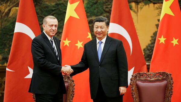 Turkish President Recep Tayyip Erdogan and Chinese President Xi Jinping attend a signing ceremony ahead of the Belt and Road Forum in Beijing, China May 13, 2017 - Sputnik International