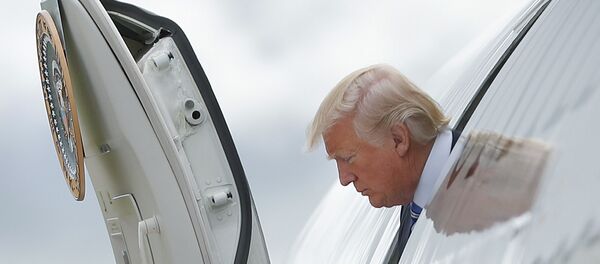 President Donald Trump steps out of Air Force One President Donald Trump steps out of Air Force One - Sputnik International
