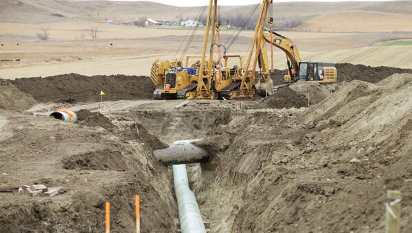 Construction equipment sits near a Dakota Access Pipeline construction site off County Road 135 near the town of Cannon Ball, North Dakota, U.S. on October 30, 2016 - Sputnik International