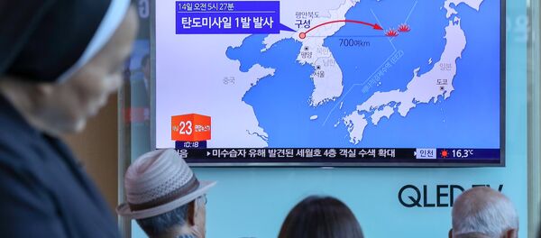 People watch a news report on North Korea firing a ballistic missile, at a railway station in Seoul, South Korea, May 14, 2017 People watch a news report on North Korea firing a ballistic missile, at a railway station in Seoul, South Korea, May 14, 2017 - Sputnik International