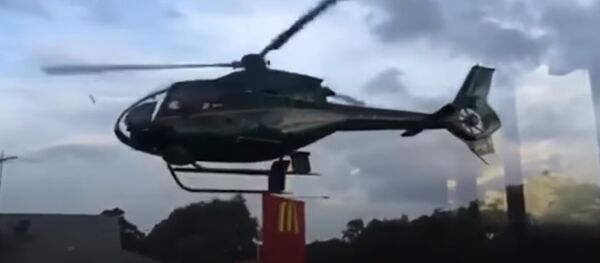 Man Lands Helicopter At A Sydney McDonald's To Collect Order Man Lands Helicopter At A Sydney McDonald's To Collect Order - Sputnik International