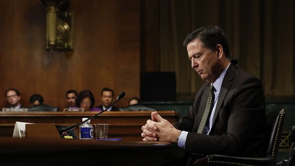 In this Wednesday, May 3, 2017, photo then-FBI Director James Comey pauses as he testifies on Capitol Hill in Washington, before a Senate Judiciary Committee hearing - Sputnik International