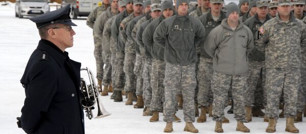 To welcome Minnesota National Guard troops to Camp Vaernes, Norway, a flag-raising ceremony is held to commemmorate the partnership in peace between two nations. The ceremony held on 14 Feb. marked the beginning of the 40th annual Norwegian Exchange. - Sputnik International