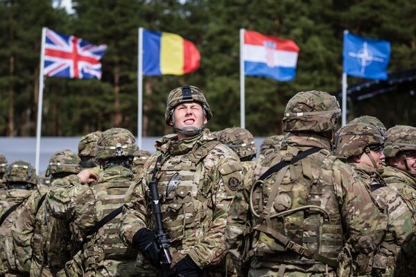 US soldiers are pictured prior the beginning of the official welcoming ceremony of NATO troops in Orzysz, Poland, on April 13, 2017. US soldiers are pictured prior the beginning of the official welcoming ceremony of NATO troops in Orzysz, Poland, on April 13, 2017. - Sputnik International