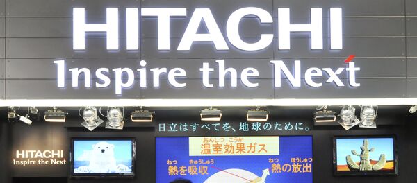 Visitors crowd at a booth of Japanese electronics maker Hitachi Ltd in Tokyo, Japan Visitors crowd at a booth of Japanese electronics maker Hitachi Ltd in Tokyo, Japan - Sputnik International