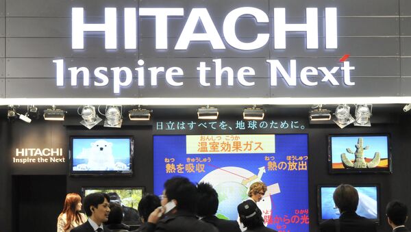 Visitors crowd at a booth of Japanese electronics maker Hitachi Ltd in Tokyo, Japan - Sputnik International