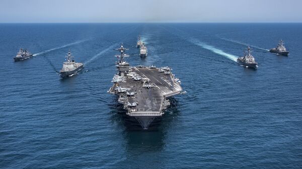 In this image released by the U.S. Navy, the aircraft carrier USS Carl Vinson, flanked by South Korean destroyers, from left, Yang Manchun and Sejong the Great, and the U.S.Navy's Wayne E. Meyer and USS Michael Murphy, transit the western Pacific Ocean Wednesday, May 3, 2017. - Sputnik International
