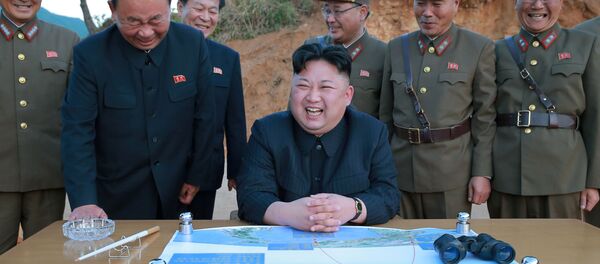 North Korean leader Kim Jong Un reacts during the long-range strategic ballistic rocket Hwasong-12 (Mars-12) test launch in this undated photo released by North Korea's Korean Central News Agency (KCNA) on May 15, 2017. North Korean leader Kim Jong Un reacts during the long-range strategic ballistic rocket Hwasong-12 (Mars-12) test launch in this undated photo released by North Korea's Korean Central News Agency (KCNA) on May 15, 2017. - Sputnik International
