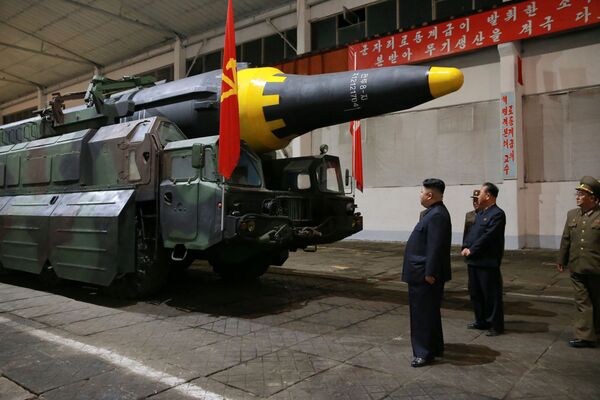 North Korean leader Kim Jong Un inspects the long-range strategic ballistic rocket Hwasong-12 (Mars-12) in this undated photo released by North Korea's Korean Central News Agency (KCNA) on May 15, 2017. North Korean leader Kim Jong Un inspects the long-range strategic ballistic rocket Hwasong-12 (Mars-12) in this undated photo released by North Korea's Korean Central News Agency (KCNA) on May 15, 2017. - Sputnik International