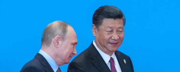May 15, 2017. Russian President Vladimir Putin and Chinese President Xi Jinping, right, during the welcome ceremony for the heads of the delegations participating in the Belt and Road Forum, at the Yanqi Lake International Convention Center. - Sputnik International
