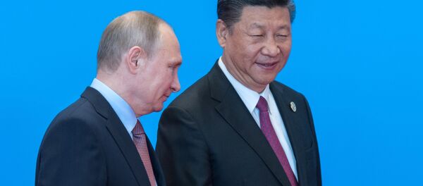 May 15, 2017. Russian President Vladimir Putin and Chinese President Xi Jinping, right, during the welcome ceremony for the heads of the delegations participating in the Belt and Road Forum, at the Yanqi Lake International Convention Center. - Sputnik International
