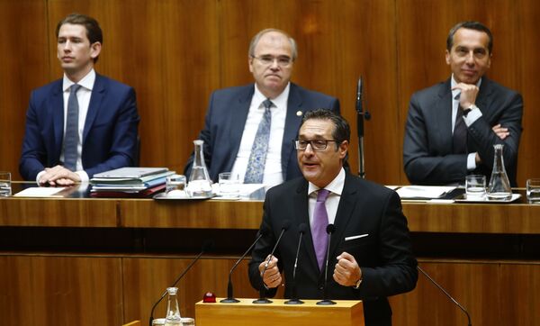 Head of Austrian Freedom Party (FPOe) Heinz-Christian Strache delivers a speech in front of Austria's Foreign Minister Sebastian Kurz, Justice Minister Wolfgang Brandstetter and Chancellor Christian Kern (L-R) during a session of the parliament in Vienna, Austria, May 16, 2017. Head of Austrian Freedom Party (FPOe) Heinz-Christian Strache delivers a speech in front of Austria's Foreign Minister Sebastian Kurz, Justice Minister Wolfgang Brandstetter and Chancellor Christian Kern (L-R) during a session of the parliament in Vienna, Austria, May 16, 2017. - Sputnik International