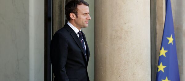 French President Emmanuel Macron waits for a guest on the steps at the Elysee Palace in Paris, France, May 16, 2017. - Sputnik International