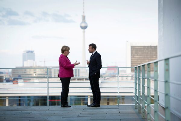 German Chancellor Angela Merkel and French President Emmanuel Macron meet at the Chancellery in Berlin, Germany May 15, 2017 German Chancellor Angela Merkel and French President Emmanuel Macron meet at the Chancellery in Berlin, Germany May 15, 2017 - Sputnik International