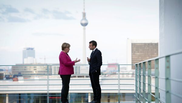 German Chancellor Angela Merkel and French President Emmanuel Macron meet at the Chancellery in Berlin, Germany May 15, 2017 - Sputnik International