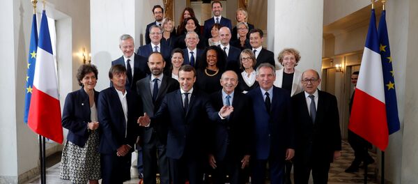French President Emmanuel Macron (4thL) and Prime Minister Edouard Philippe (3rdL) pose for a family photo after the first cabinet meeting at the Elysee Palace in Paris, France, May 18, 2017. French President Emmanuel Macron (4thL) and Prime Minister Edouard Philippe (3rdL) pose for a family photo after the first cabinet meeting at the Elysee Palace in Paris, France, May 18, 2017. - Sputnik International