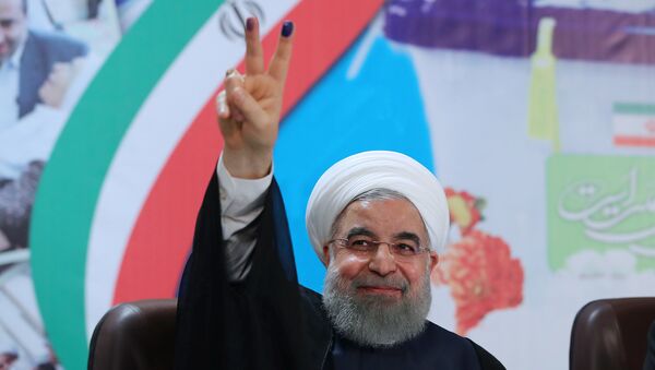 Iran's President Hassan Rouhani gestures as he registers to run for a second four-year term in the May election, in Tehran, Iran, April 14, 2017. - Sputnik International