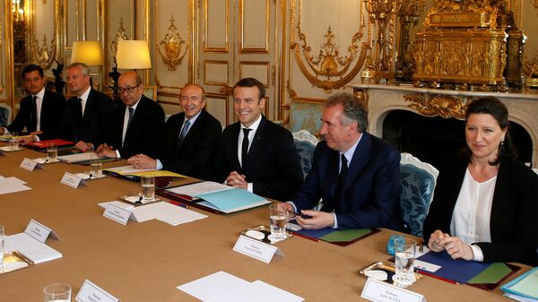 French President Emmanuel Macron (3rdR) chairs his first cabinet meeting as President with his newly named ministers, from the left, Budget Minister Gerald Darmanin, Economy Minister Bruno Le Maire, Foreign and European Minister Jean-Yves Le Drian, Interior Minister Gerard Collomb, Justice Minister Francois Bayrou, and Health and Solidarity Minister Agnes Buzyn, at the Elysee Palace in Paris, France, May 18, 2017 - Sputnik International