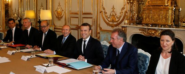 French President Emmanuel Macron (3rdR) chairs his first cabinet meeting as President with his newly named ministers, from the left, Budget Minister Gerald Darmanin, Economy Minister Bruno Le Maire, Foreign and European Minister Jean-Yves Le Drian, Interior Minister Gerard Collomb, Justice Minister Francois Bayrou, and Health and Solidarity Minister Agnes Buzyn, at the Elysee Palace in Paris, France, May 18, 2017 - Sputnik International