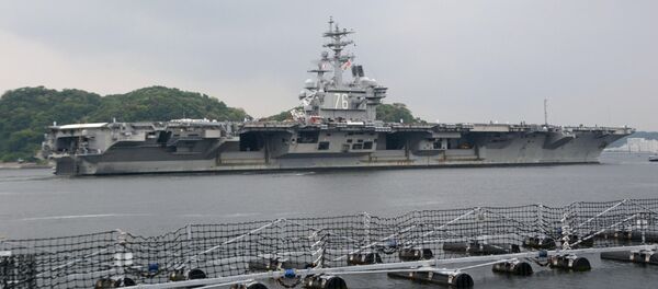 USS Ronald Reagan, a Nimitz-class nuclear-powered supercarrier, leaves from its home port to be deployed in waters near Japan, in Yokosuka, south of Tokyo, Japan, in this photo taken by Kyodo May 16, 2017 USS Ronald Reagan, a Nimitz-class nuclear-powered supercarrier, leaves from its home port to be deployed in waters near Japan, in Yokosuka, south of Tokyo, Japan, in this photo taken by Kyodo May 16, 2017 - Sputnik International