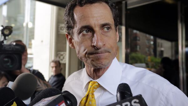 In this July 24, 2013 file photo, New York City mayoral candidate Anthony Weiner leaves his apartment building in New York - Sputnik International