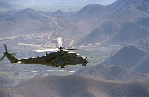 A Mi-24 helicopter on a mission in the vicinity of the Kabul-Herat road A Mi-24 helicopter on a mission in the vicinity of the Kabul-Herat road - Sputnik International