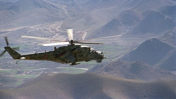 A Mi-24 helicopter on a mission in the vicinity of the Kabul-Herat road - Sputnik International