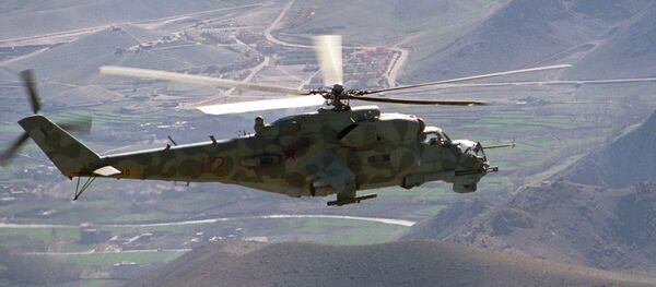A Mi-24 helicopter on a mission in the vicinity of the Kabul-Herat road A Mi-24 helicopter on a mission in the vicinity of the Kabul-Herat road - Sputnik International