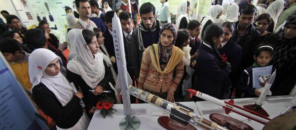 Indian students look at models of missiles in an exhibition by the Indian Defense Research and Development Organization (DRDO) at the 101st Indian Science Congress in Jammu, India, Friday, Feb. 7, 2014 - Sputnik International