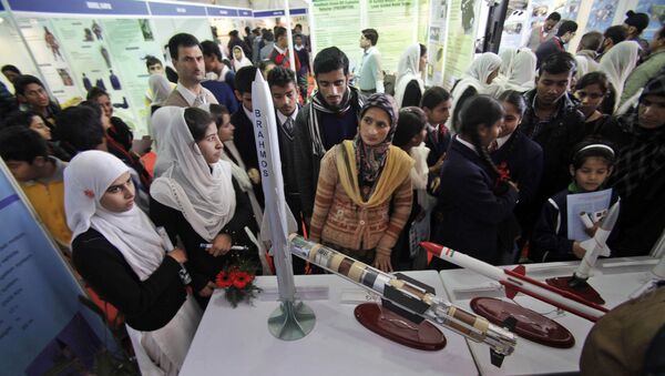 Indian students look at models of missiles in an exhibition by the Indian Defense Research and Development Organization (DRDO) at the 101st Indian Science Congress in Jammu, India, Friday, Feb. 7, 2014 - Sputnik International