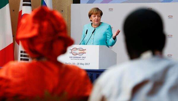 German Chancellor Angela Merkel gives a speech at the meeting of the G20 health ministers in Berlin, Germany, May 19, 2017. - Sputnik International