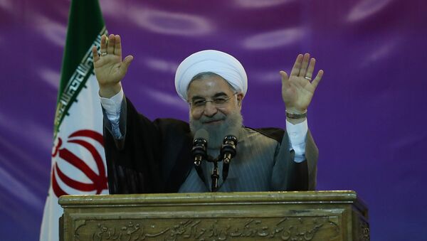 Iran's President Hassan Rouhani gestures during a ceremony celebrating International Workers' Day, in Tehran, Iran, May 1, 2017 - Sputnik International