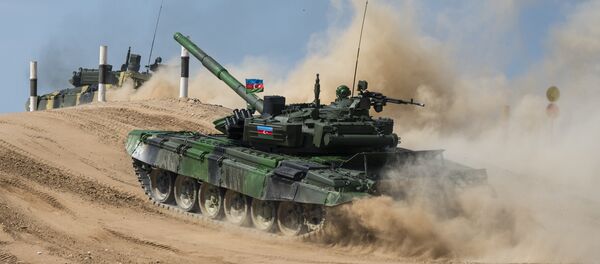 Azerbaijan's T-72B3 tank crew seen competing in the semifinals of the Tank Biathlon competitions at the Alabino range Azerbaijan's T-72B3 tank crew seen competing in the semifinals of the Tank Biathlon competitions at the Alabino range - Sputnik International