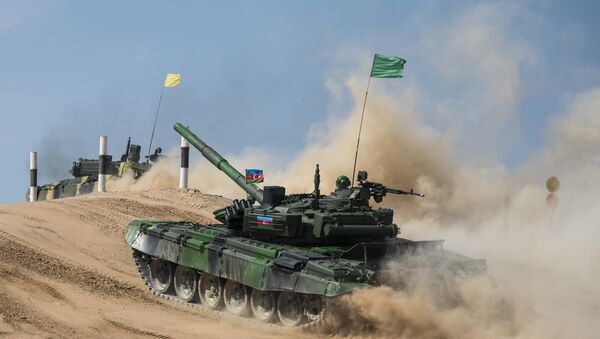 Azerbaijan's T-72B3 tank crew seen competing in the semifinals of the Tank Biathlon competitions at the Alabino range - Sputnik International