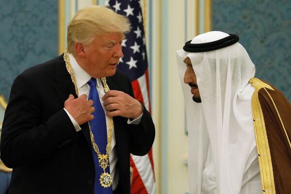 Saudi Arabia's King Salman bin Abdulaziz Al Saud (R) presents U.S. President Donald Trump with the Collar of Abdulaziz Al Saud Medal at the Royal Court in Riyadh, Saudi Arabia May 20, 2017 Saudi Arabia's King Salman bin Abdulaziz Al Saud (R) presents U.S. President Donald Trump with the Collar of Abdulaziz Al Saud Medal at the Royal Court in Riyadh, Saudi Arabia May 20, 2017 - Sputnik International