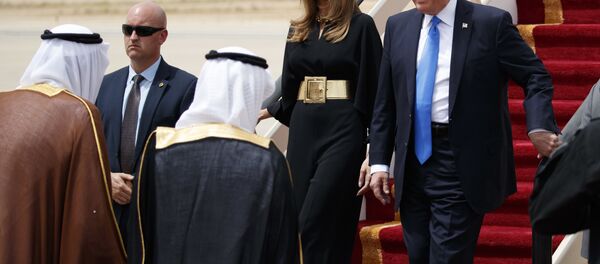 U.S. President Donald Trump, accompanied by first lady Melania Trump, smiles at Saudi King Salman, left, upon his arrival at a welcome ceremony at the Royal Terminal of King Khalid International Airport, Saturday, May 20, 2017, in Riyadh. U.S. President Donald Trump, accompanied by first lady Melania Trump, smiles at Saudi King Salman, left, upon his arrival at a welcome ceremony at the Royal Terminal of King Khalid International Airport, Saturday, May 20, 2017, in Riyadh. - Sputnik International