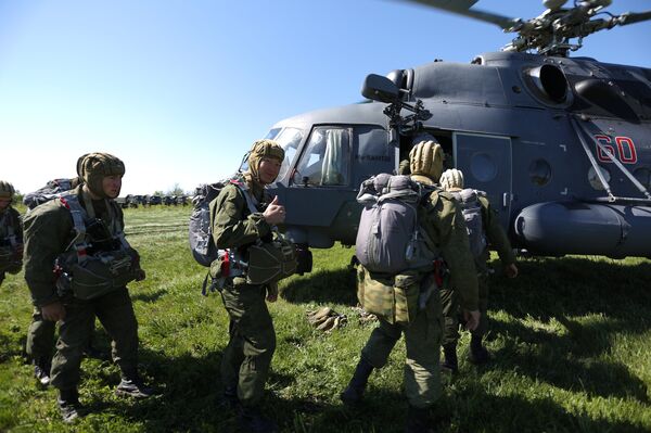 Servicemen of a special purpose unit of Russia's Southern Military District during drills on airborne landing from the Mi-8AMTSh helicopters. File photo Servicemen of a special purpose unit of Russia's Southern Military District during drills on airborne landing from the Mi-8AMTSh helicopters. File photo - Sputnik International