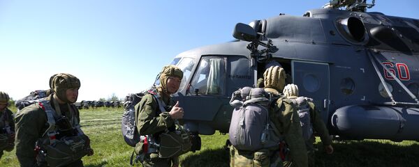 Servicemen of a special purpose unit of Russia's Southern Military District during drills on airborne landing from the Mi-8AMTSh helicopters. File photo - Sputnik International
