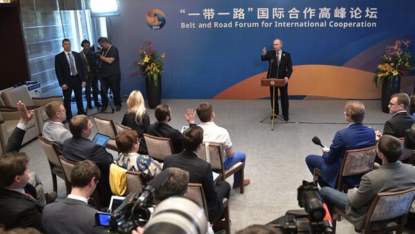 May 15, 2017. Russian President Vladimir Putin during a media scrum with the Russian press following his participation in the Belt and Road Forum for International Cooperation - Sputnik International