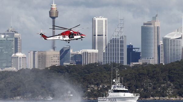 Police and emergency services train with an ambulance helicopter in Sydney Harbour in Sydney, Australia, Wednesday, July 27, 2016 - Sputnik International