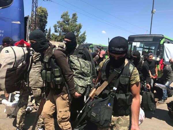 Sunday saw the complete withdrawal of militants from the western Syrian city of Homs Sunday saw the complete withdrawal of militants from the western Syrian city of Homs - Sputnik International