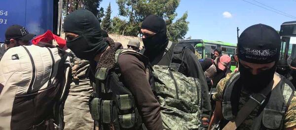 Sunday saw the complete withdrawal of militants from the western Syrian city of Homs Sunday saw the complete withdrawal of militants from the western Syrian city of Homs - Sputnik International