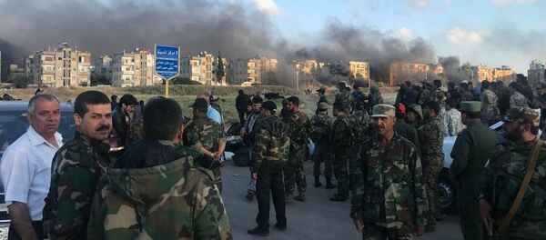 Sunday saw the complete withdrawal of militants from the western Syrian city of Homs Sunday saw the complete withdrawal of militants from the western Syrian city of Homs - Sputnik International