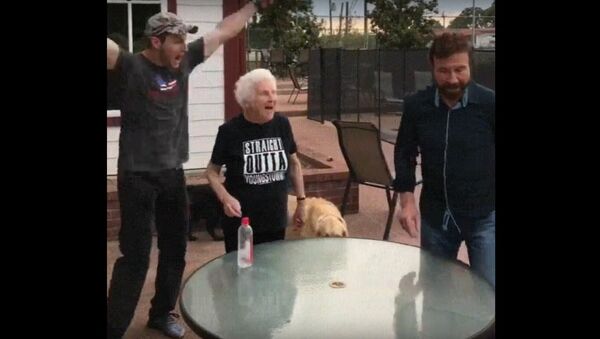 Chuck Norris Flips Water Bottle with Grandma - Sputnik International