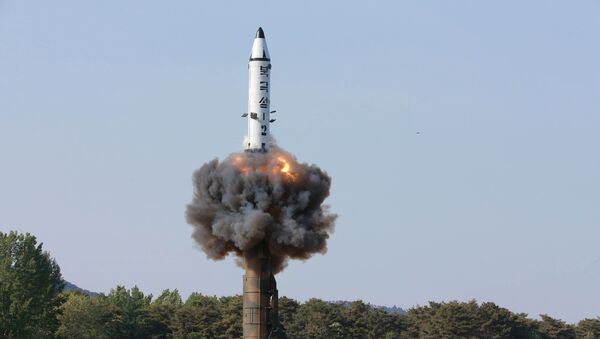 The scene of the intermediate-range ballistic missile Pukguksong-2's launch test in this undated photo released by North Korea's Korean Central News Agency (KCNA) May 22, 2017 - Sputnik International