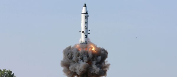 The scene of the intermediate-range ballistic missile Pukguksong-2's launch test in this undated photo released by North Korea's Korean Central News Agency (KCNA) May 22, 2017 - Sputnik International
