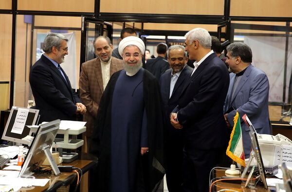 Iran's President Hassan Rouhani visits the election office in Tehran, Iran, May 19, 2017. Picture taken May 19, 2017 Iran's President Hassan Rouhani visits the election office in Tehran, Iran, May 19, 2017. Picture taken May 19, 2017 - Sputnik International